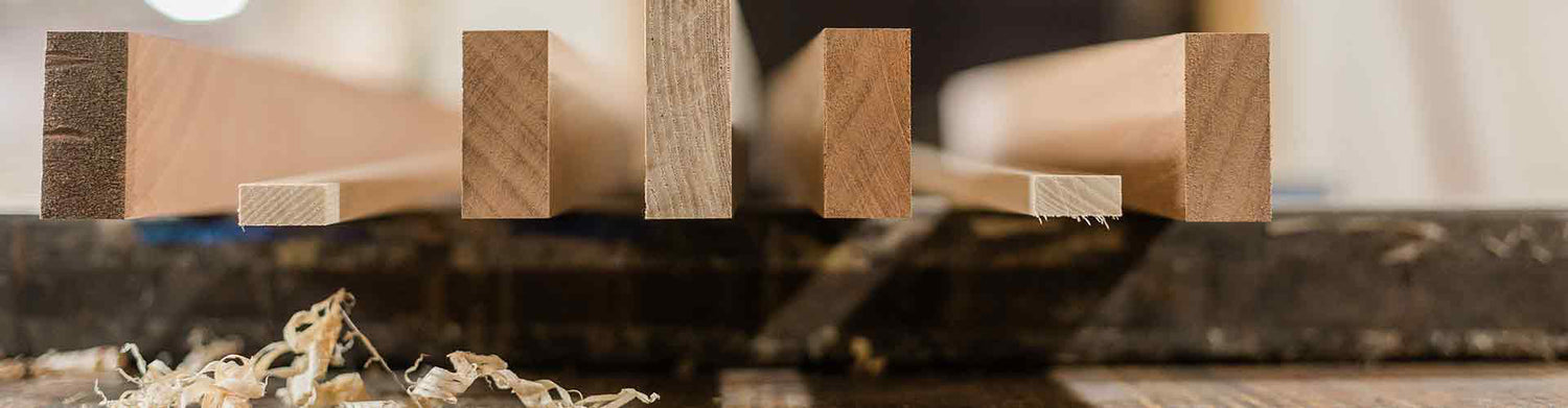 A close up of the individual wood components of what will become a Deviate Longboard.