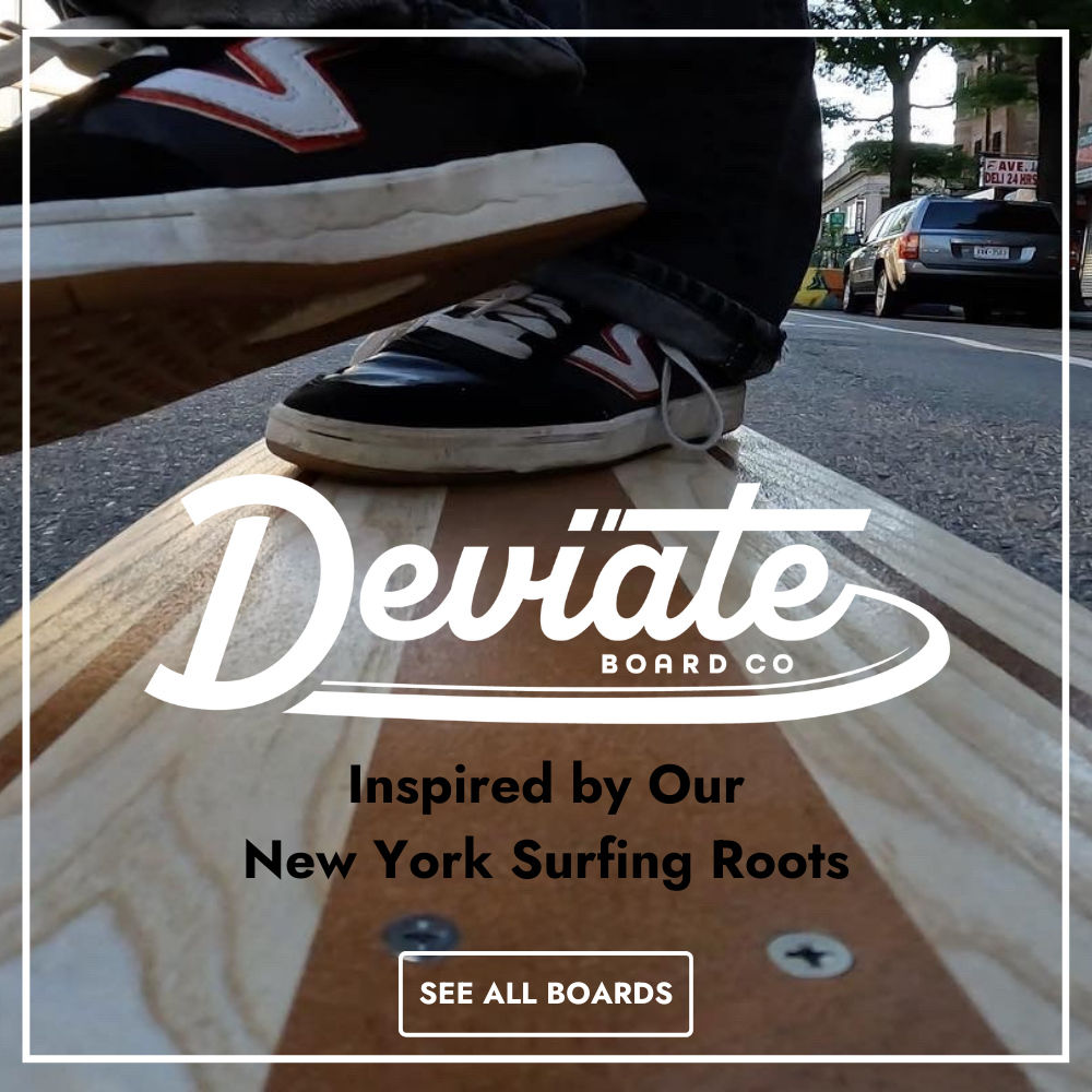 Skating a Deviate Longboard on a Brooklyn street.